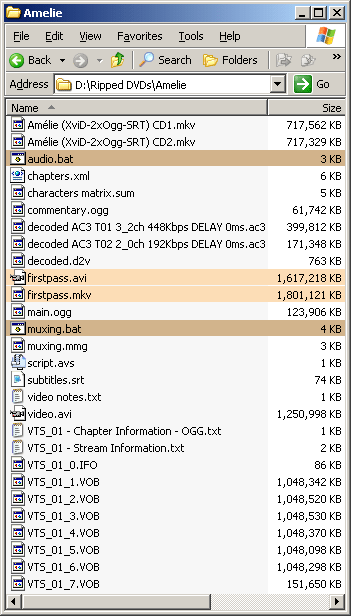 The example ripping folder now contains files named "Amélie (XviD-2xOgg-SRT) CD1.mkv", "Amélie (XviD-2xOgg-SRT) CD2.mkv", "chapters.xml", and "muxing.mmg".